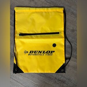 Yellow Drawstring daypack.  Dunlop motorcycle